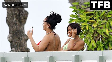Rihanna Sexy Seen Showing Off Her Boobs In A Red Bikini Top In Barbados Aznude