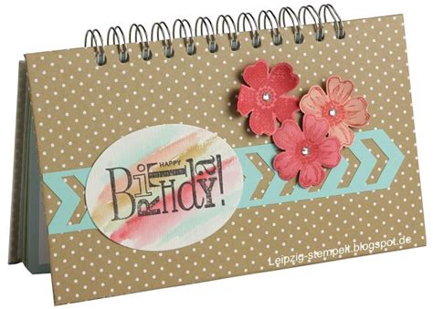 A Close Up Of A Calendar With Flowers On It