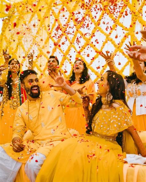 55 Gorgeous Haldi Dresses And Outfits To Inspire You Latest Indian Wedding Photography Poses