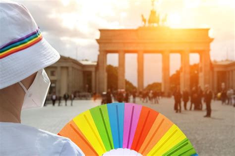 Premium Photo Mature Caucasian Lgbt Woman In Berlin With Rainbow Fan And Ribbon On White