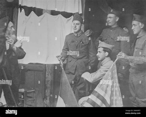 Group Of Allied Soldiers Having Their Photograph Taken By An Elderly