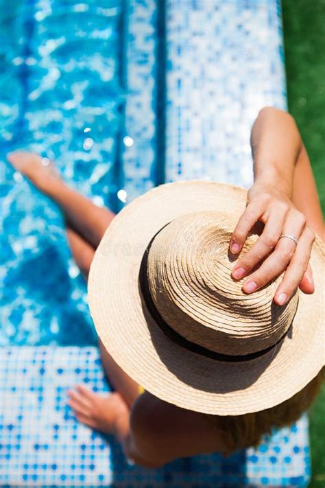 Woman Relaxing On The Swimming Pool Water In Hot Sunny Day Summer Holiday Idyllic Stock Image