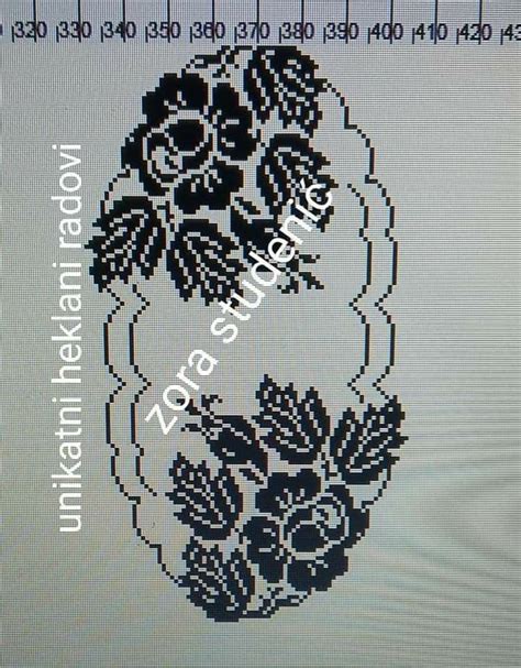 The Screen Is Displaying An Image Of Flowers And Leaves In Black On A