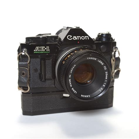 Canon AE 1 Program 135mm SLR Film Camera With 50mm FD Lens And Canon