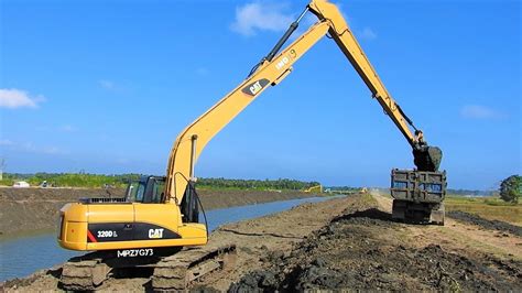 Long Reach Excavator Digging Widening River Canal Cat 320d L Komatsu