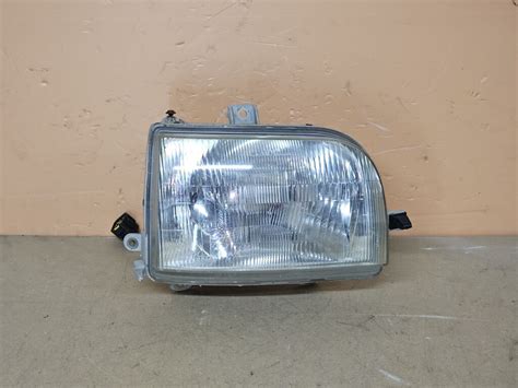 Передняя правая фара Daihatsu Move (95-1999г.в).: 3300 KGS Передние ...