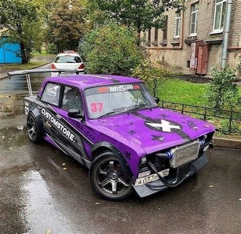 Purple Drifting Car in the Rain