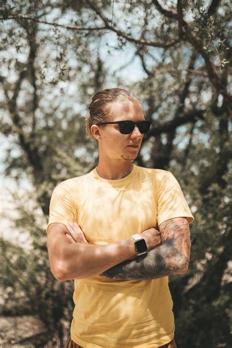 Blonde Man With Pony Tail Standing On The Beach Stock Photo Image Of Summer Coast 259821962