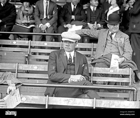 Babe Ruth Sitting In The Stands Of A Baseball Game Ca Stock Photo