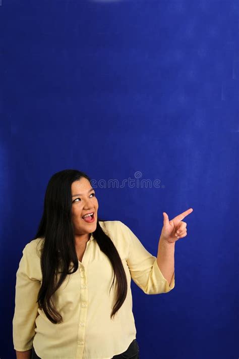 40 Year Old Latina Woman In A Bathrobe Drinks A Cup Of Coffee In Her Kitchen To Avoid Diabetes