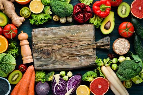 Healthy Organic Food On A Blue Wooden Background Vegetables And Fruits