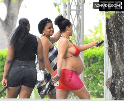 Rihanna Sexy Seen Showing Off Her Boobs In A Red Bikini Top In Barbados Aznude
