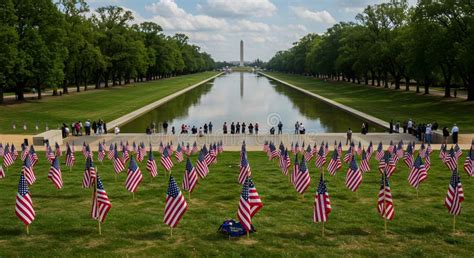 Visitors View The Washington Monument From The Reflecting Pool