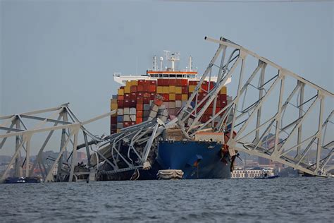 Baltimore Key Bridge Collapses After Ship Collision Search Ongoing For