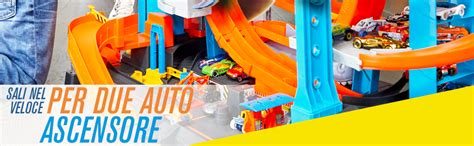 Hot Wheels City Garage Delle Acrobazie Playset Con Pista Collegabile Con Ascensore E Squalo
