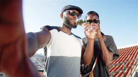 Free Stock Video Pov Of Happy Gay Couple Drinking Wine At Camera On Rooftop