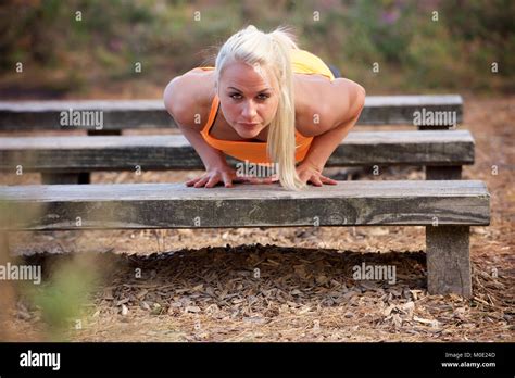 Beautiful Blonde Girl Keeping Fit In An Outdoor Location Stock Photo Alamy