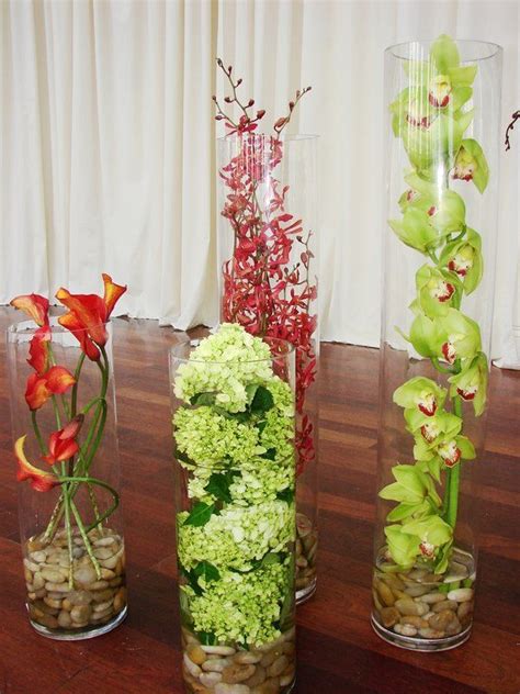 This Is A Selection Of Tall Cylinder Vases Featuring Calla Lilies