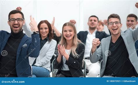 Group Of Happy Employees Applauds In The Conference Room Stock Image