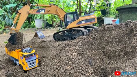 Rc Excavator Cat Wl Loader Rocks And Soil To Dump Truck