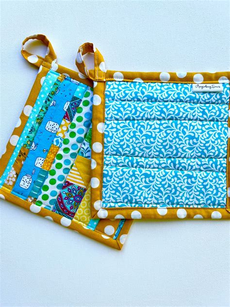 Set Of Two Quilted Patchwork Potholders Hot Pads Trivets Yellow Teal Etsy