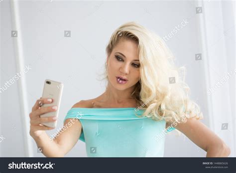 Стоковая фотография 1448865626 Sexy Blonde Selfie Seductive Blonde