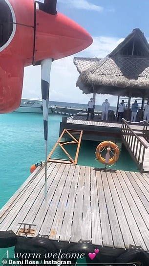 Demi Rose Showcases Her Very Ample Assets In A Tiny Gold Sparkly Bikini Top During Maldives