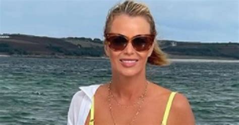 Amanda Holden Wows Fans In Tiny Yellow Bikini As They Say She Should Be Next Bond Girl