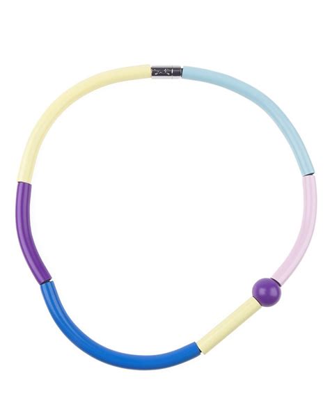 a blue, yellow and purple necklace with an oval bead on the end is shown