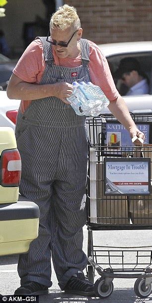 The Sex Pistols John Lydon Wears Striped Dungarees To The Shop In His Yellow Volvo Daily Mail