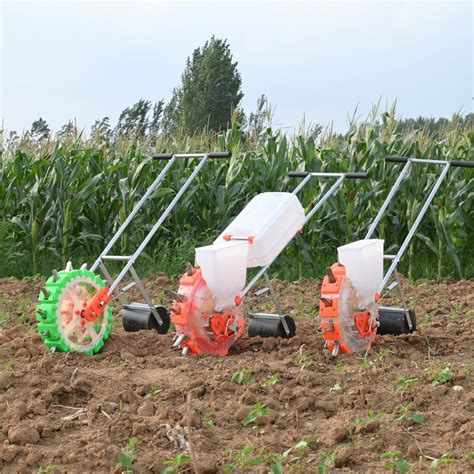 small multi functional hand push corn soybean seeder  fertilizer
