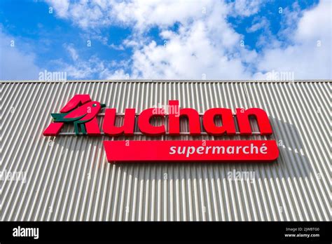 Internationally Recognised French Auchan Supermarket Name And Logo