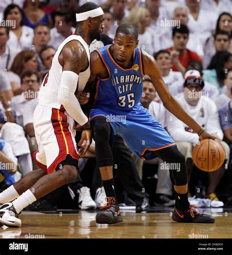 Oklahoma City Thunder Small Forward Kevin Durant 35 Drives Against Small Forward Lebron James