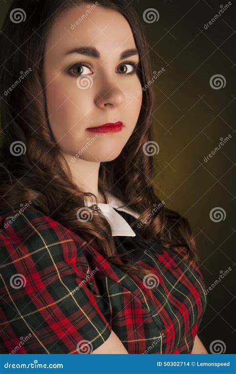 Cute Brunette In Tartan Dress With Red Lips And Curles Studio Portrait Stock Photo Image Of