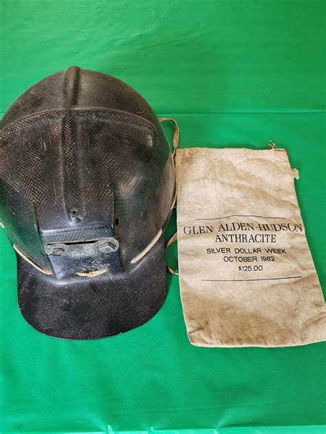 Grandfather's child size coal mine helmet and paybag. : r/mildlyinteresting