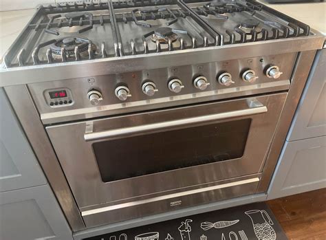 ILVE 90cm Gas 6 burner stove and electric oven, removable legs for free