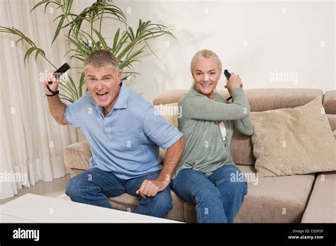 Mature Couple Playing Video Game Stock Photo Alamy
