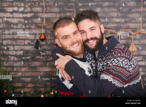 Portrait Of Happy Gay Couple Embracing At Christmas Stock Photo Alamy