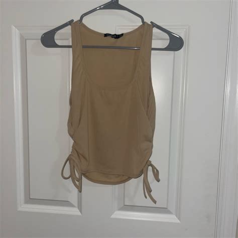 Brand New Nude Tank Top Has Strings On The Side To Depop