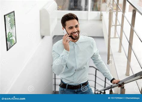 Portrait Of Handsome Man Talking On Mobile Phone Stock Photo Image Of