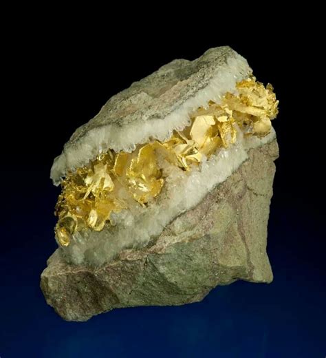 Natural gold in quartz specimen | Raw gold nuggets on stone, Gold
