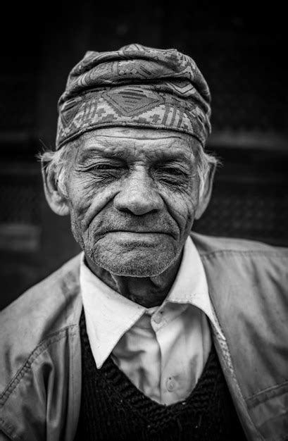 Premium Photo Close Up Portrait Of Mature Man Wearing Hat