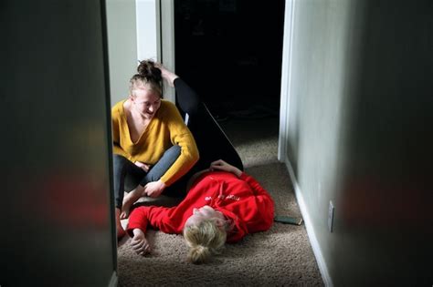Premium Photo Smiling Lesbian Couple Relaxing Rug At Home