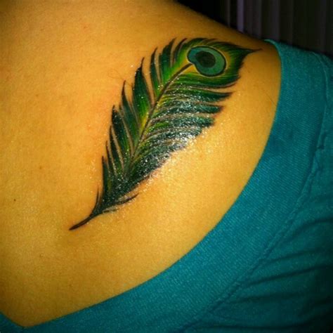 Pin By Kelly Puckett On Tattoos Peacock Feather Tattoo Feather