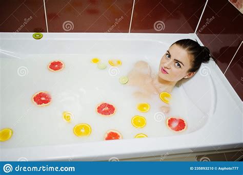 Brunette Girl At The Bathroom With Milk And Fruits Stock Photo Image Of Beauty Food