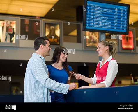 Couple Buying Movie Tickets Box Hi Res Stock Photography And Images Alamy