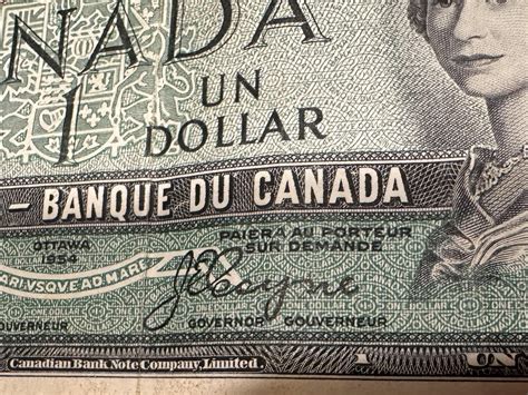 Devil’s Face 1954 Canadian 1$ bill? : r/Antiques