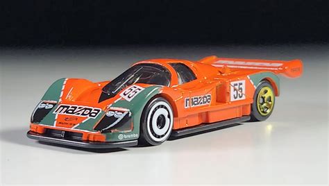 Машинка Базова Hot Wheels Mazda 787B Race Day 1 64 HTC79 Orange купити в інтернет магазині