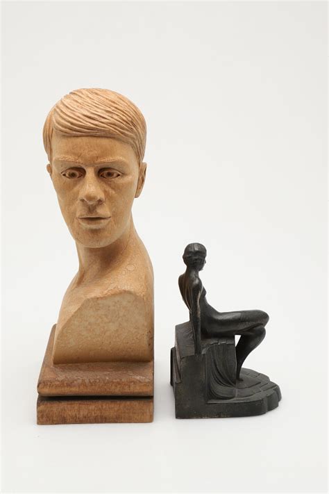 A CARVED WOODEN BUST OF A GENTLEMAN AND A DECO STYLE SPELTER FIGURE OF A FEMALE NUDE Art