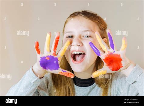 Portrait Girl With Painted Hands Stock Photo Alamy